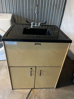 Jonti-Craft Clean Hands Helper portable sink.