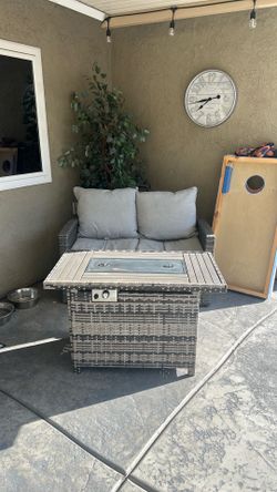 Whicker outdoor patio seat and whicker propane fire pit