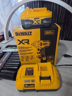 Dewalt 20v XR 1/2 mid torque impact wrench with battery and charger and 1/2 socket set and carry bag