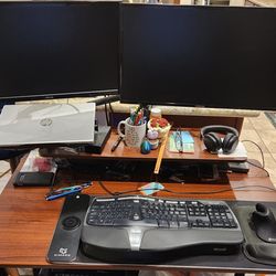 Ergonomic table with 24" and 27" 1080p monitors
