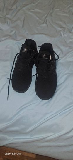 All-Black Low-Top Sneakers Adidas brand