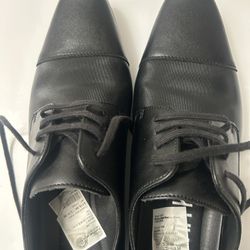 Calvin Klein black shoes for man size 9M.