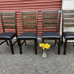 Wooden table and four chairs