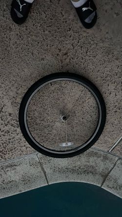 One Schwinn Bike Rim With Tube And Grips