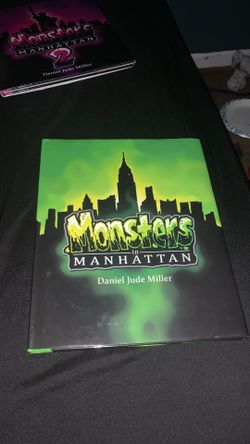 Autographed Monsters in Manhattan by Daniel Jude Miller