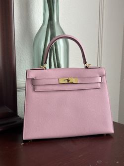 Cherry blossom pink structured bag with golden hardware