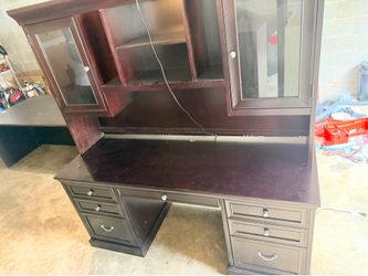 Executive 4-drawer vertical file, wood-laminate finish, smooth operation, good condition.