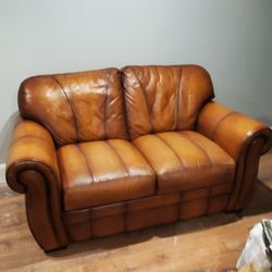 Grade 5 Real Leather Sofa $400.00