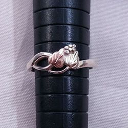 silver ring with  10k gold size 7