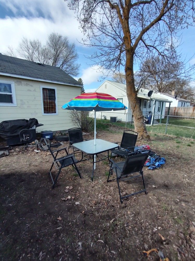 Outdoor Table And Chairs And Umbrella