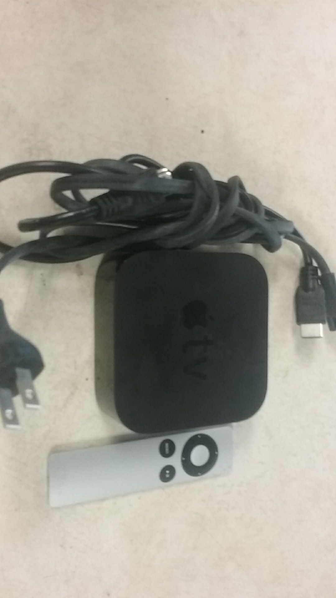 Apple tv with cords and remote