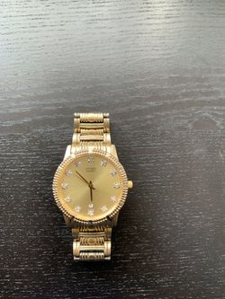 Yellow Gold Citizens Watch With Diamond Accents. 