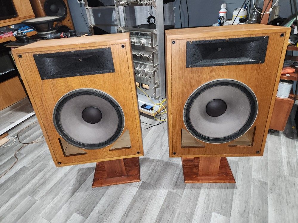 A set of wood Speaker cabinets.