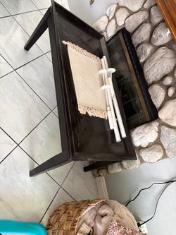 Black living room tables and vanity chairs