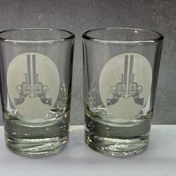 Set of (2) Santos Frost and Clear Shot Glasses with 2 Pistols 2 3/4”. Tequila Revolucion Shot Glasses. 