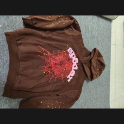 Brown spider hoodie with red and pink accents 