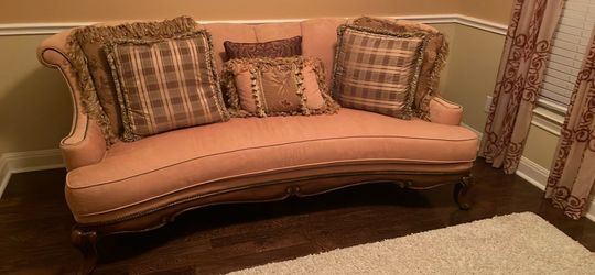 Haverty’s elegant formal sofa with pillows
