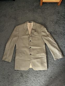 Slightly used (Jones New York) gold men's suit.