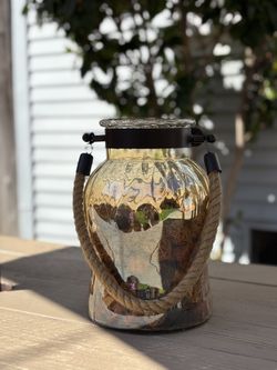 Decorative Jar With Dry Flowers Inside $10