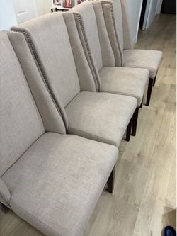 4 Beige Chairs/ with Silver/Walnut accents