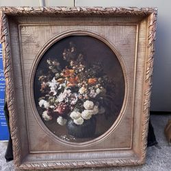 An ornate 19th-century Italian floral still life oil painting.
