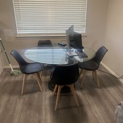 Glass dining/kitchen table with 4 chairs