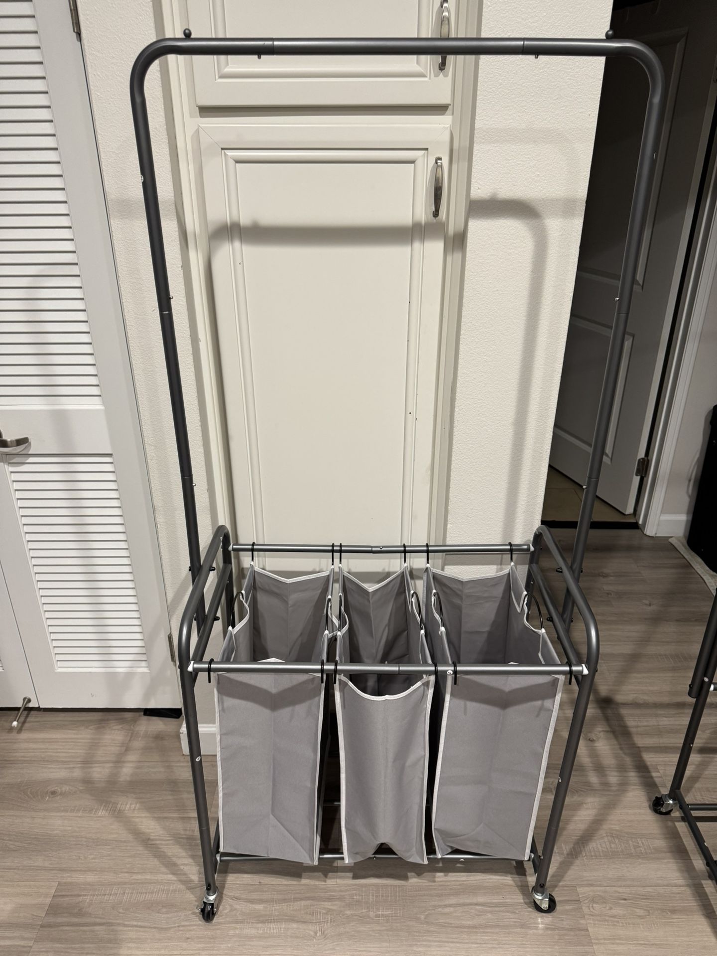 Rolling 3-Bag Laundry Sorter with Hanging Bar – 66.5” Tall
