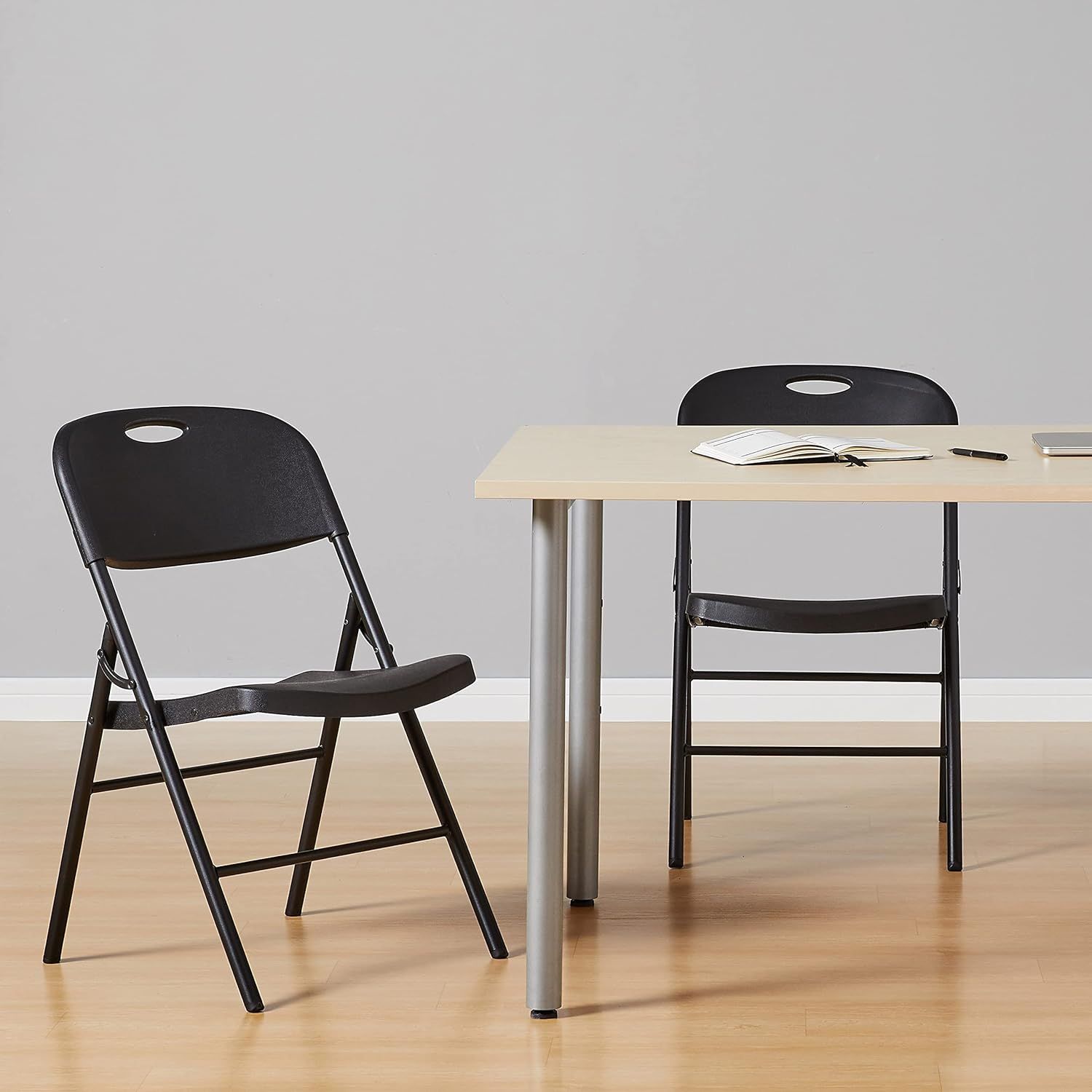 27-125 Amazon Basics Folding Plastic Chair, 350-Pound Capacity, Black, 2-Pack