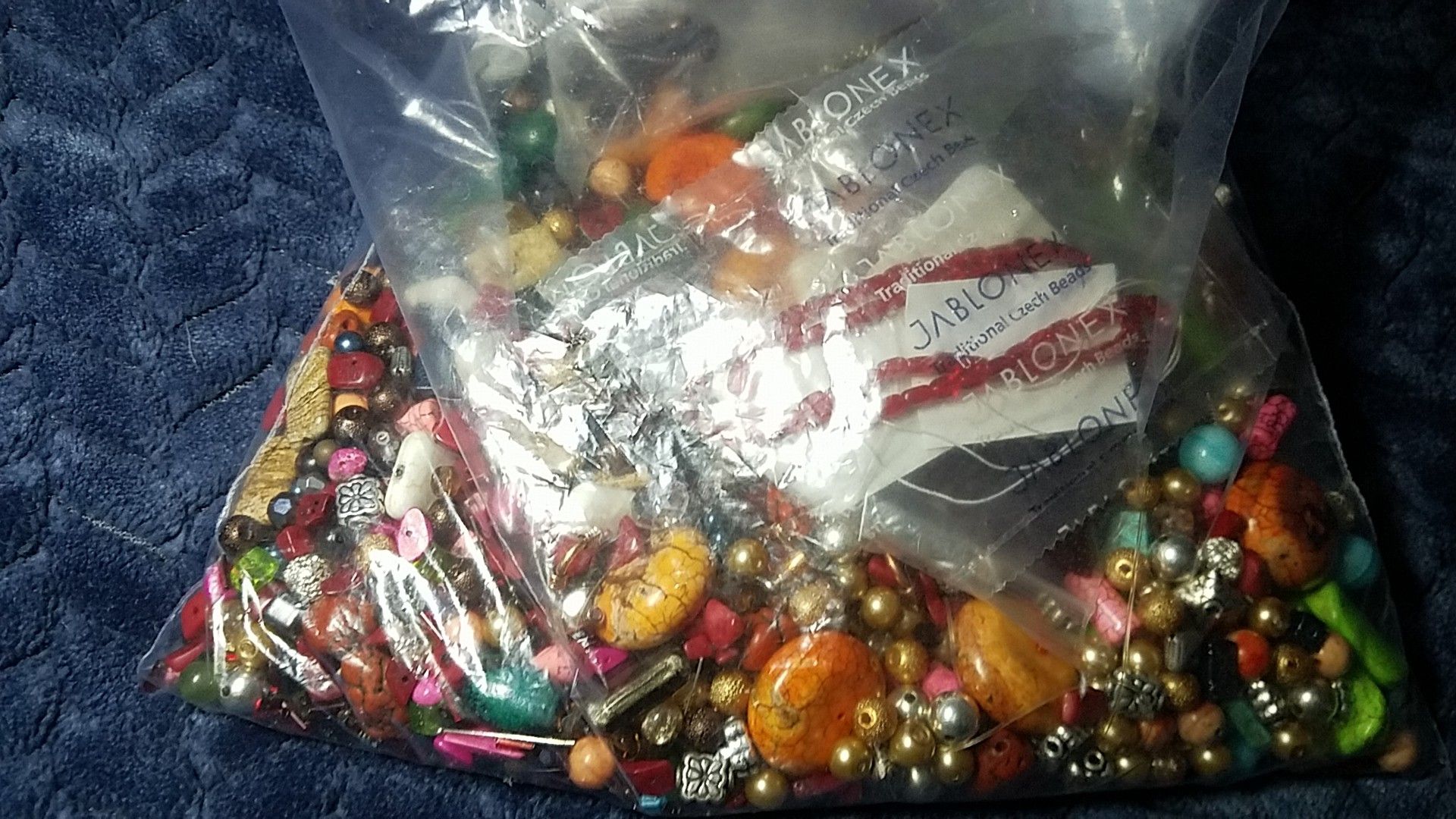 A bag full of assorted beads