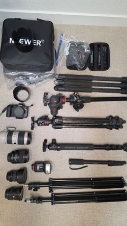 Camera set, tripod, lens, lights.