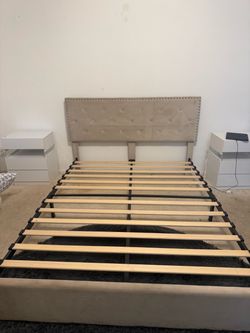 Oueen size bedframe for sale.