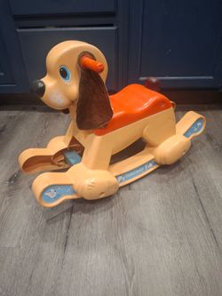 Ride On Rocking Dog  With Rubber Squeeky Tail.