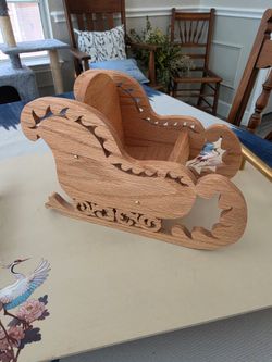 Handmade wooden Christmas sleigh centerpiece Crafted using a scroll Saw