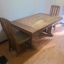 solid wood dining room table with 4 chairs