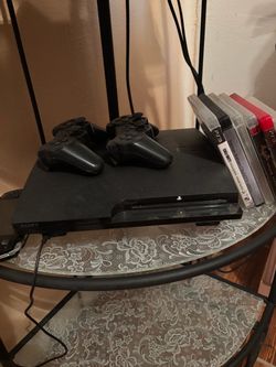 Sony PlayStation 3 Slim Bundle with 2 Controllers and Games