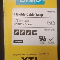 New, unused, original Dymo wire wrap. Black on White. Left over from a job.