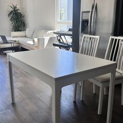 Dining table for the kitchen, white, in good  condition. From Ikea.