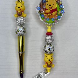 WINNIE THE POOH BADGE REEL & PEN SET