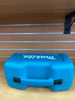 Makita BO5030 5" Random Orbit Sander in teal and black.