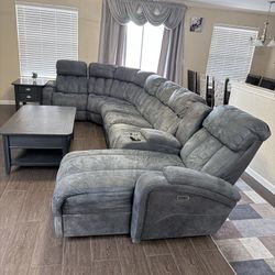 Gray power reclining sectional sofa with console & cup holders