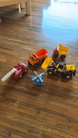 Toy trucks and helicopter