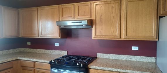 Cabinets with counter top and sink.