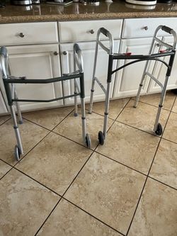 $25 Brand New Floding 2 wheel Walkers you ajustable heights