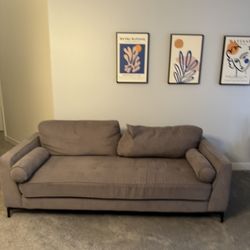 Light grey Cardi’s cloth couch