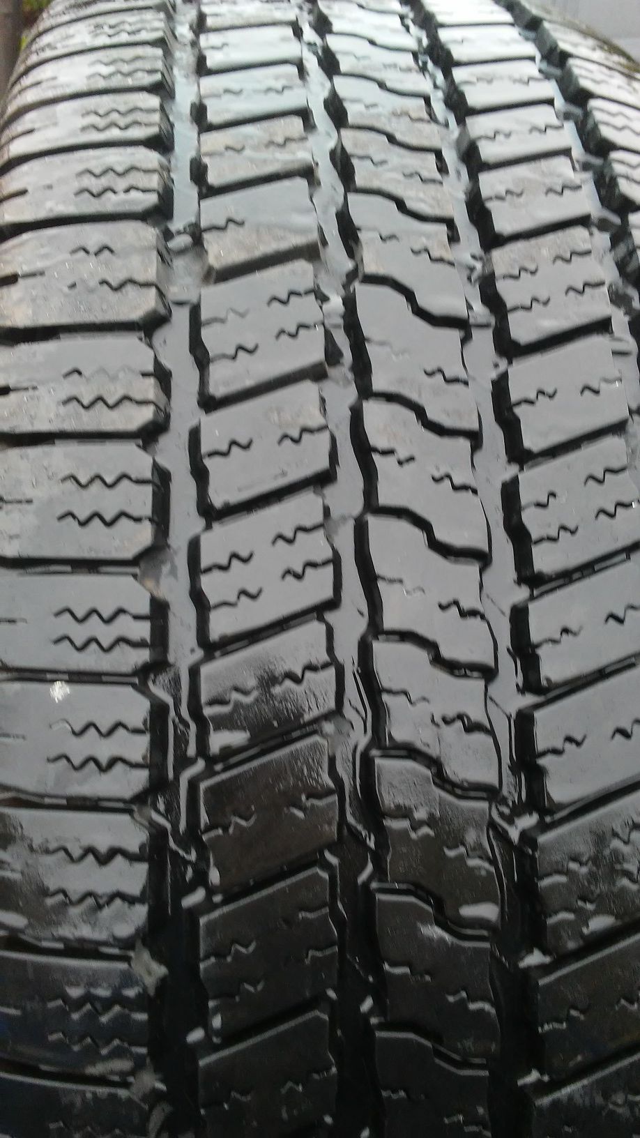 2014-2018 Oem JEEP 5 lug wheels.... Goodyear WRANGLER tires size265. 60. 18and they have 99% TREAD