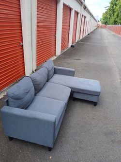 Small sectional with chaise and storage