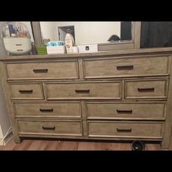 Dresser with mirror attached 