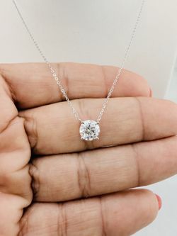 A timeless and elegant piece, perfect for layering or wearing alone. The brilliant moissanite stone offers exceptional sparkle, making it a beautiful