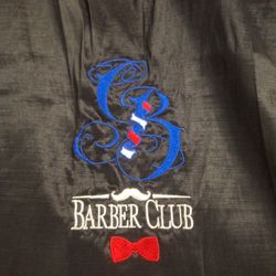 Two  BARBER CAPES IN EXCELLENT  CONDITION  Sold As Set 