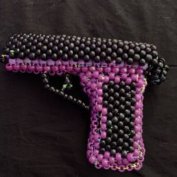 Posable purple and Black Raver Kandi Gun 